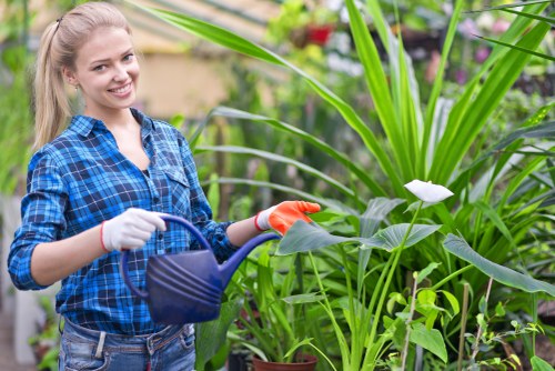 Gardener preparing tools and clipboard for safety inspection