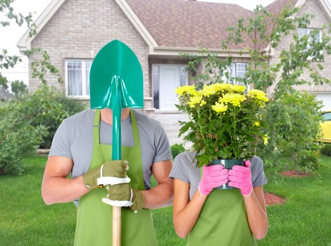 Gardener handing over reusable pots to a charity